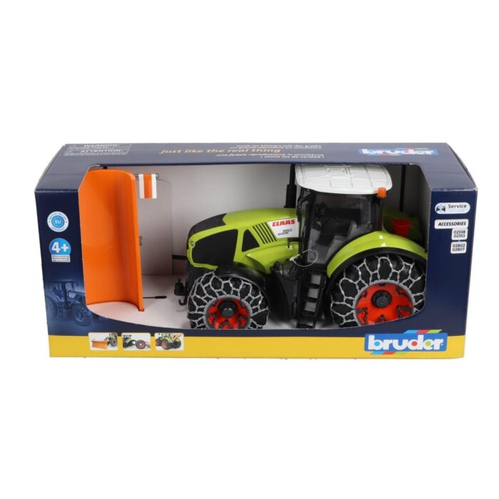 Tractor Claas Axion 950 met sneeuwkettingen en  ploegblad